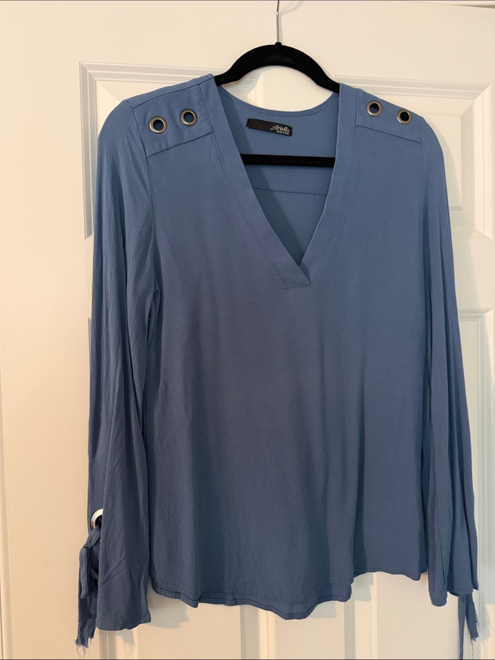 Ariella Dusty Blue V‑Neck Long Sleeve Top with Grommet Accents